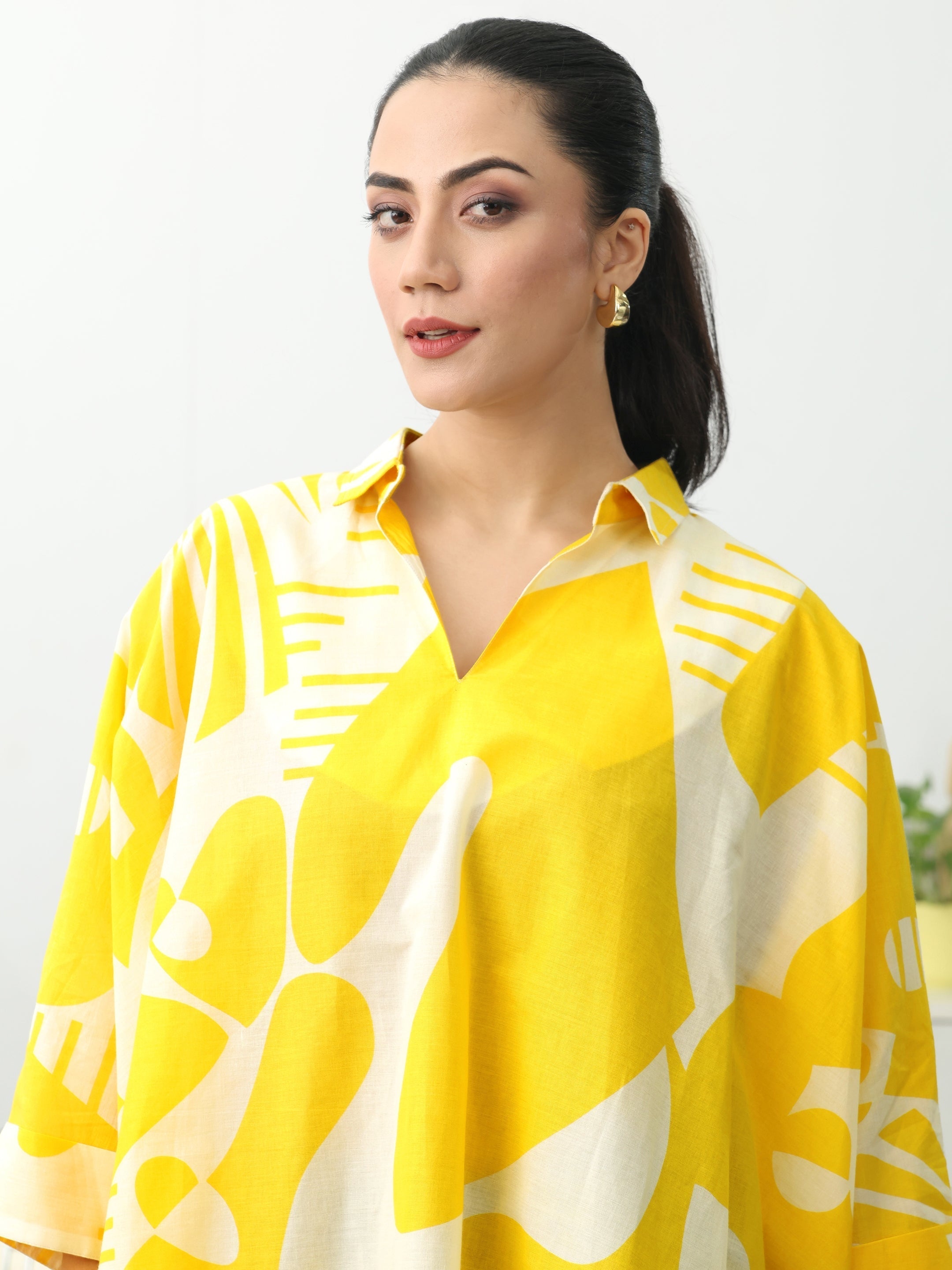 Yellow Abstract Printed Cotton Blend A-Line Short Kurti